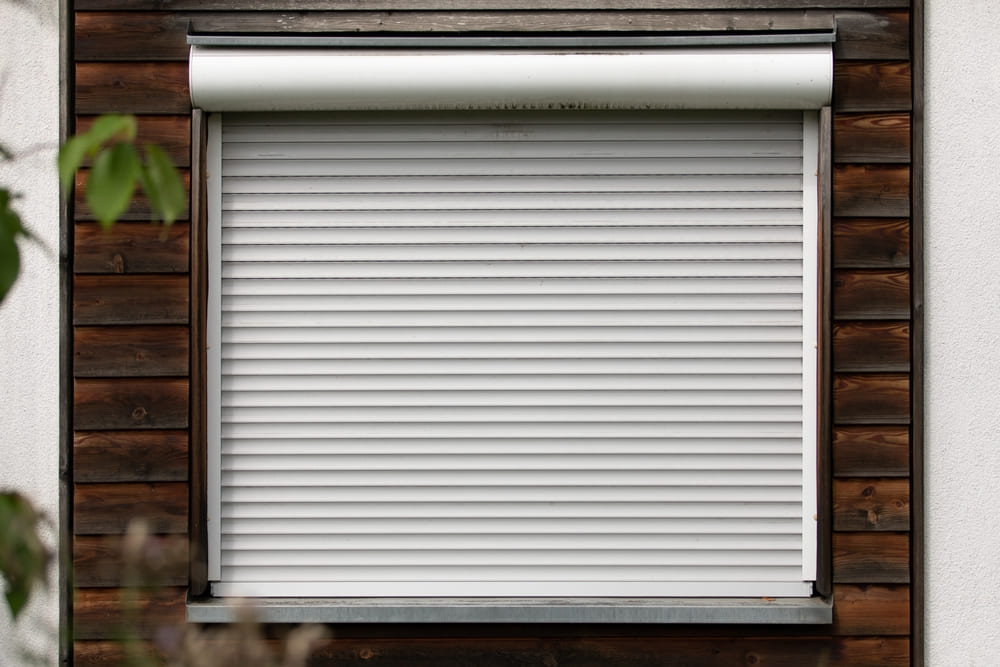 Motorised roller shutters installed on a window