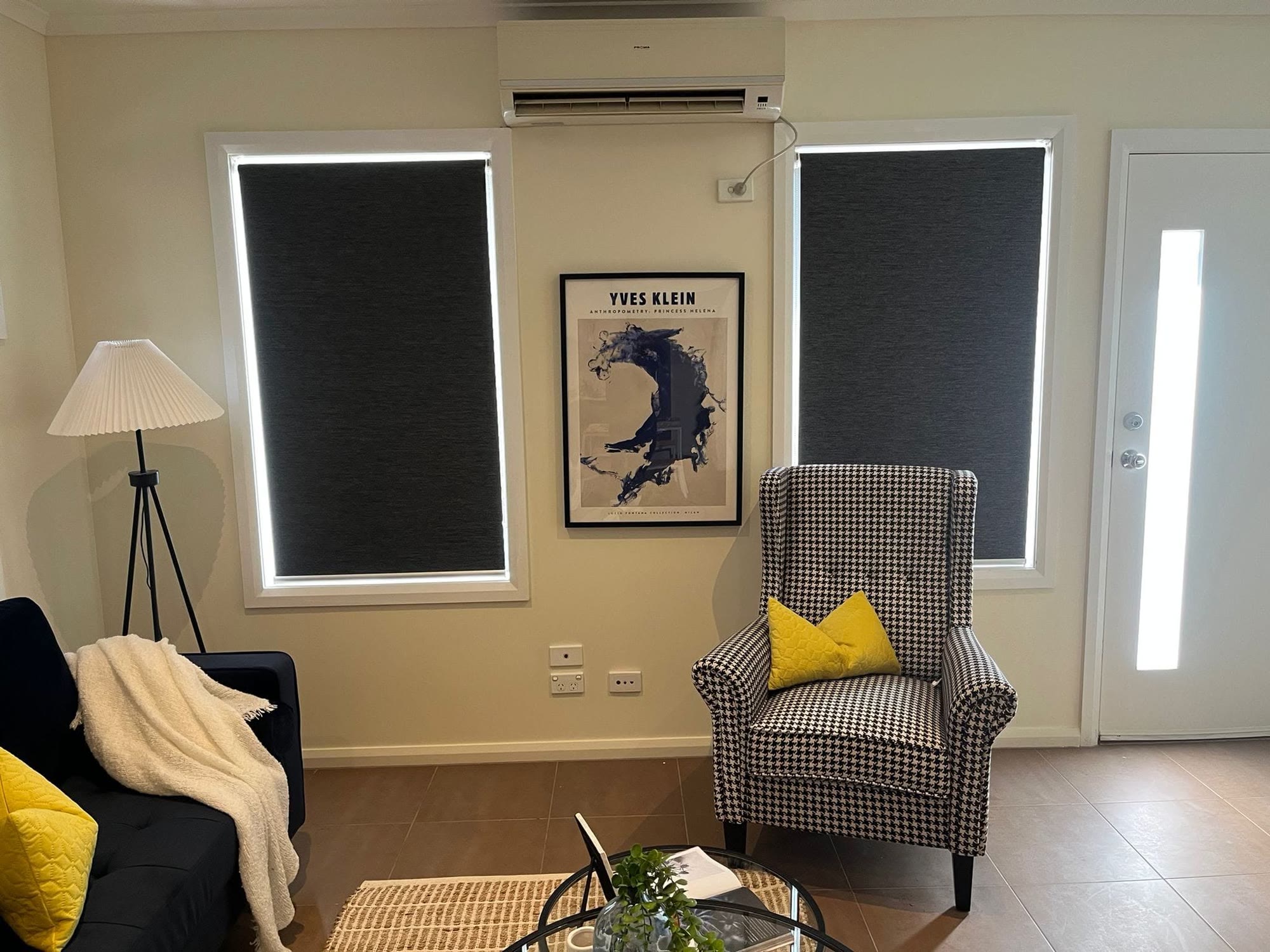 Blockout roller blinds in a styled living room